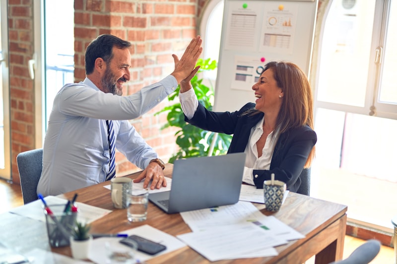 Comemoração de resultado positivo para o cliente